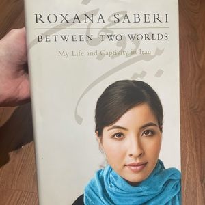Book Title: Roxana Saberi Between Two Worlds My Life and Capticiry in Iran